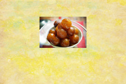 This image is about the famous sweet dish Gulab Jamun